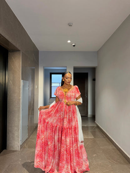 Pink chiffon Habesha zuria with silver tilf embroidery for Fasika and engagement ceremonies