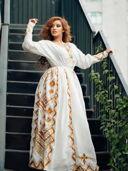Gold Ethiopian Dress – Contemporary Habesha Outfit with Unique Design for Weddings and Cultural Celebrations