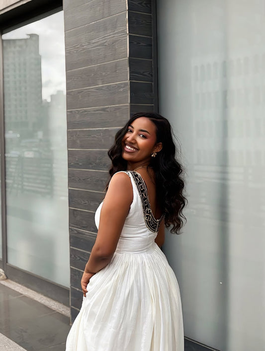 White Sleeveless Ethiopian Kemis – Light Habesha Dress for Warm Days and Cultural Wear