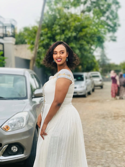 White and Gold Tilet Habesha Dress – Colorful Ethiopian Kemis with Bold Patterns