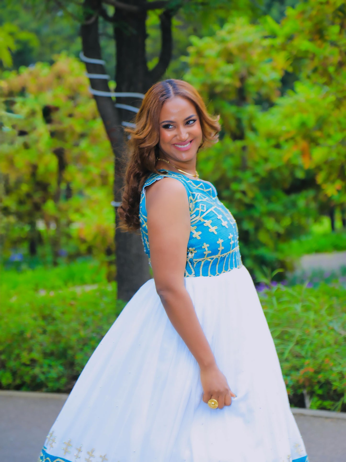 Sky Blue cotton Habesha dress with gold tilf embroidery for wedding celebrations