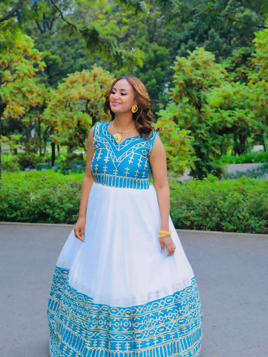 Sky Blue cotton Habesha dress with gold tilf embroidery for wedding celebrations