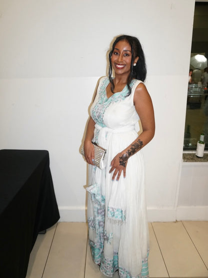 Blue Habesha Kemis for special occasions with a calm color and graceful traditional silhouette