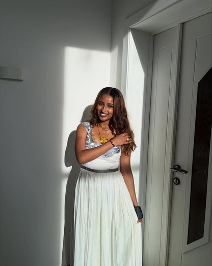Elegant White Habesha Dress with blue Traditional Embroidery for Special Occasions