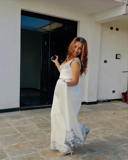 Elegant White Habesha Dress with blue Traditional Embroidery for Special Occasions