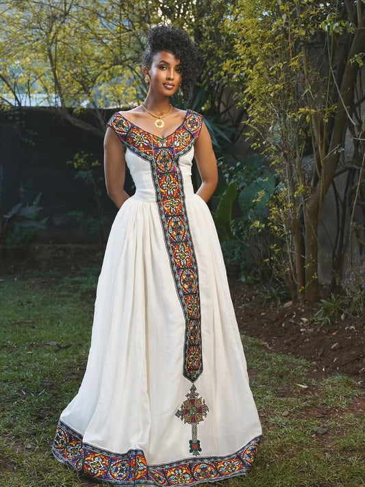 Luxury V-Neck Habesha Kemis with Multicolor Geometric Tilet Design