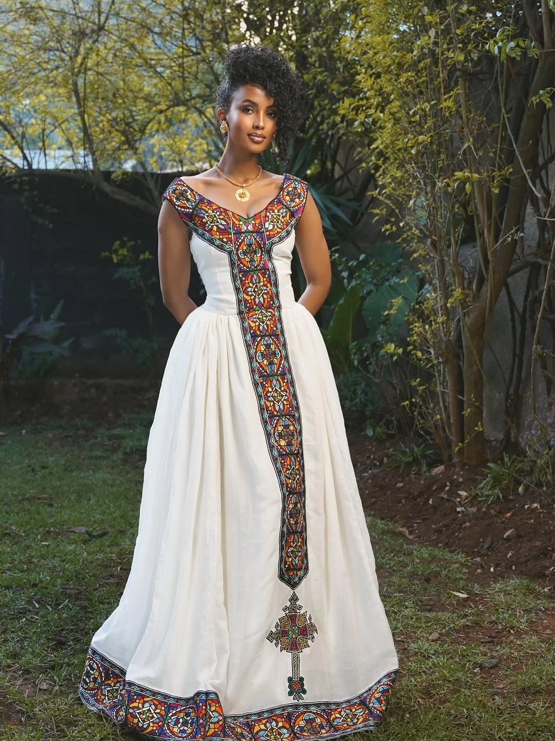 Luxury V-Neck Habesha Kemis with Multicolor Geometric Tilet Design