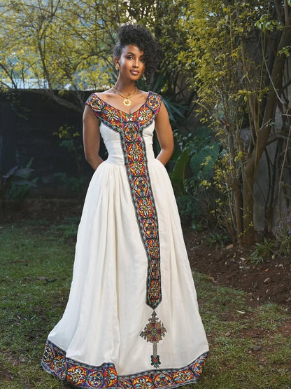 Luxury V-Neck Habesha Kemis with Multicolor Geometric Tilet Design