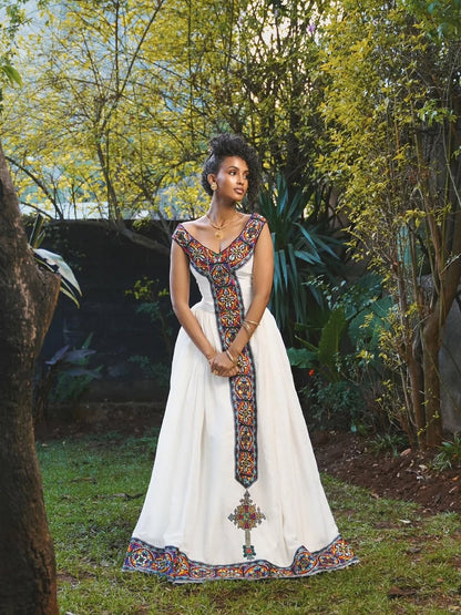 Luxury V-Neck Habesha Kemis with Multicolor Geometric Tilet Design