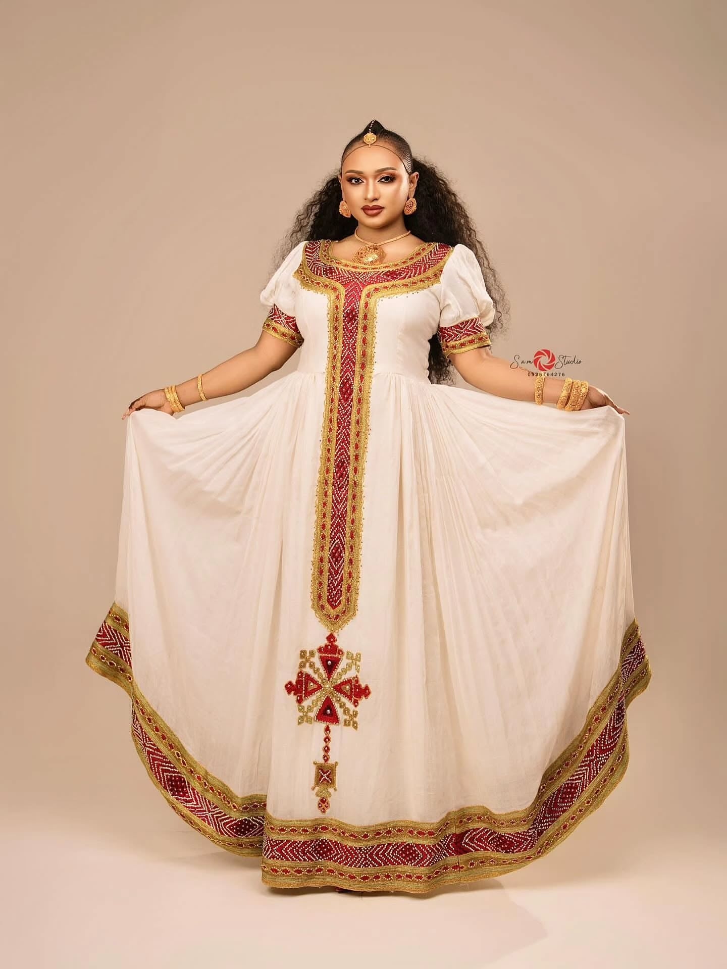 Red cotton Habesha kemis with gold embroidery for Fasika and Easter family gatherings