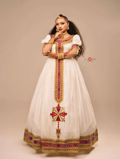 Red cotton Habesha kemis with gold embroidery for Fasika and Easter family gatherings