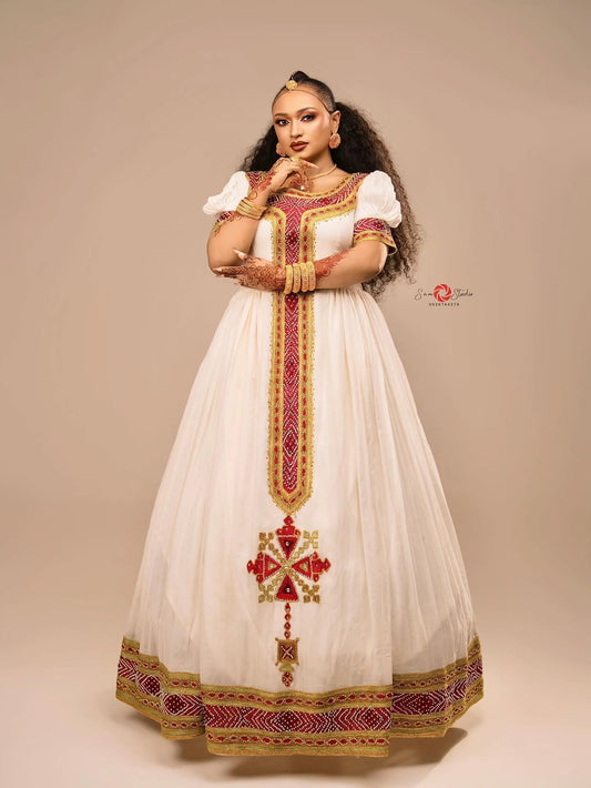 Red cotton Habesha kemis with gold embroidery for Fasika and Easter family gatherings