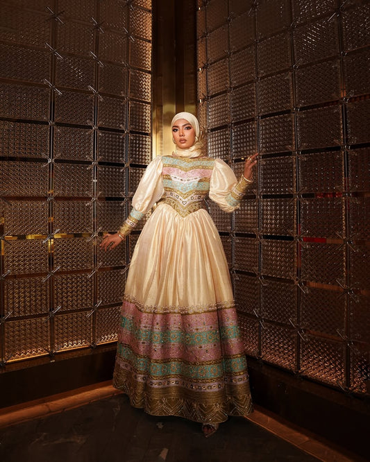 Gold Habesha Zuria – Luxury Ethiopian Dress with Embroidered Corset Bodice, Beaded Detailing, and Matching Hijab for Weddings and Formal Events