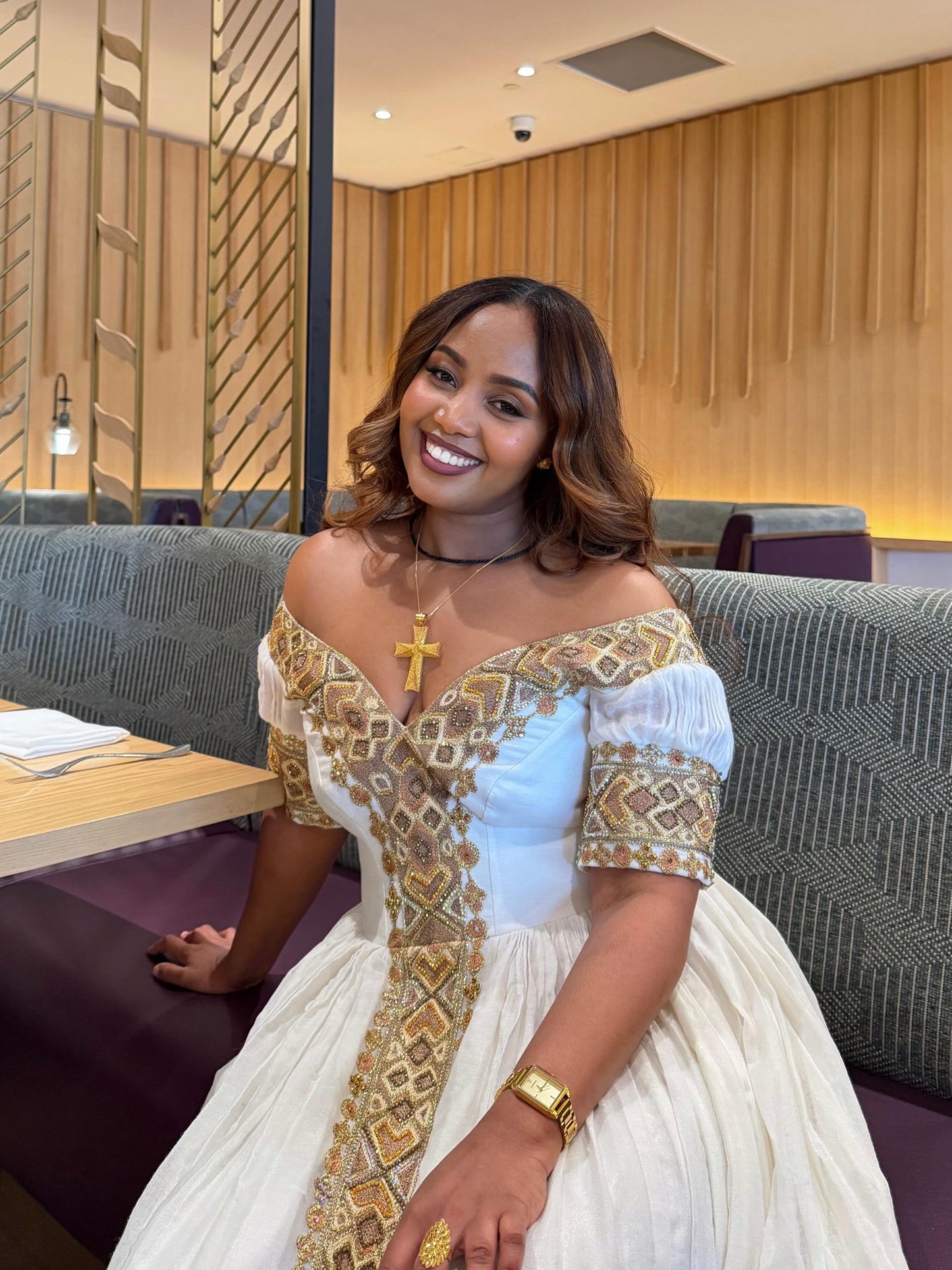 Elegant Off-the-Shoulder Gold Habesha Kemis with Traditional Embroidery for Weddings & Cultural Occasions