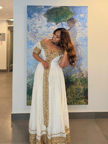 Elegant Off-the-Shoulder Gold Habesha Kemis with Traditional Embroidery for Weddings & Cultural Occasions