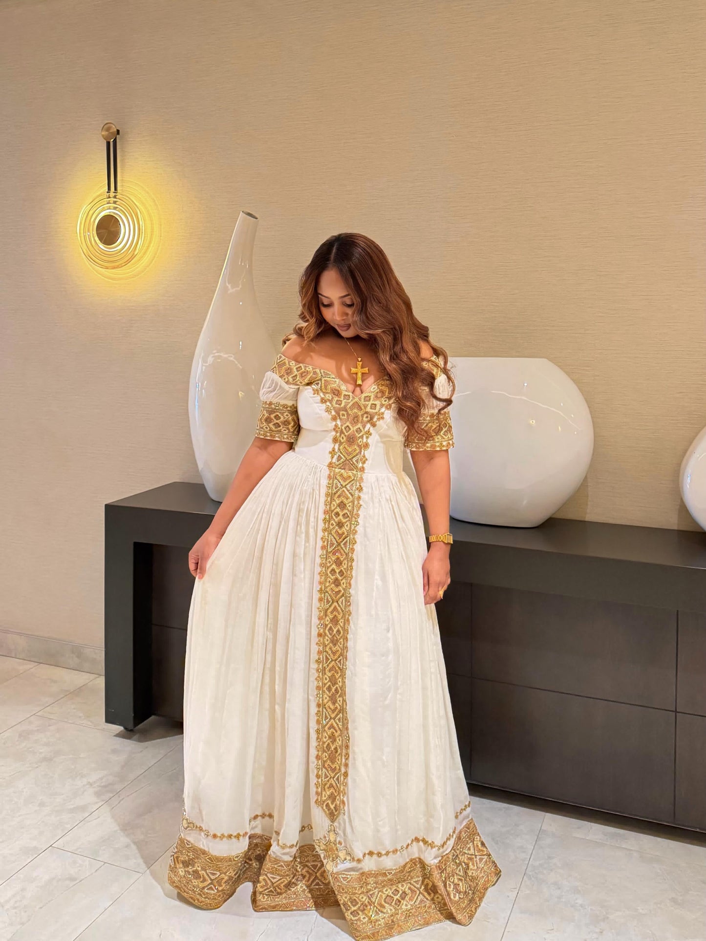 Elegant Off-the-Shoulder Gold Habesha Kemis with Traditional Embroidery for Weddings & Cultural Occasions