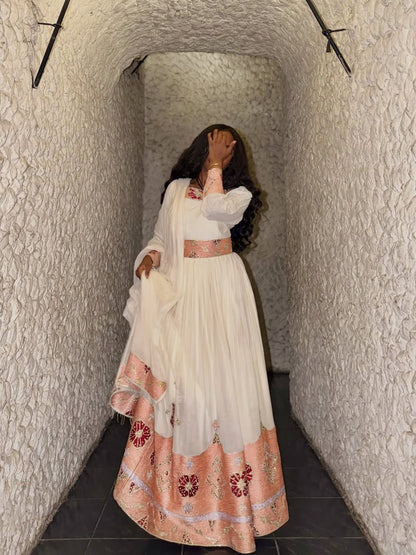 Pink Habesha Libs – Contemporary Ethiopian Traditional Dress with Artistic Hand Embroidery for Weddings, Festivals, and Ceremonial Occasions