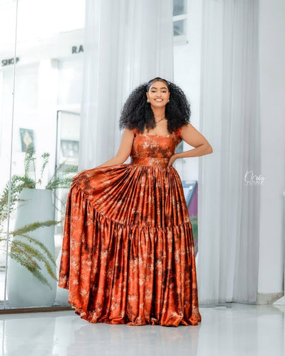 Orange Habesha Chiffon Dress with Floral Accents – Ethiopian Dress for Weddings & Celebrations