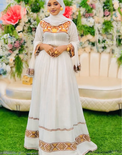 Gold Ethiopian Traditional Dress – Handcrafted Cultural kemis with Wide Tibeb Embroidery and Elegant Silhouette for Luxury Weddings & Heritage Celebrations