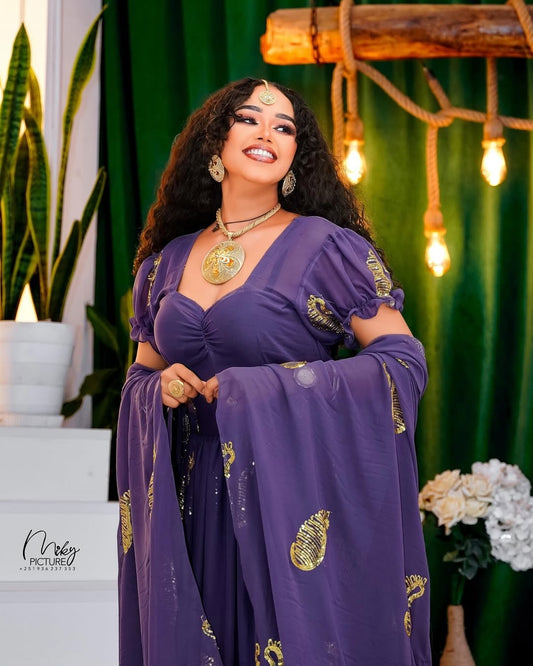 Purple Habesha Chiffon Dress with Gold Detailing – Elegant Flowing Ethiopian Outfit for Weddings, Evening Events, and Special Occasions