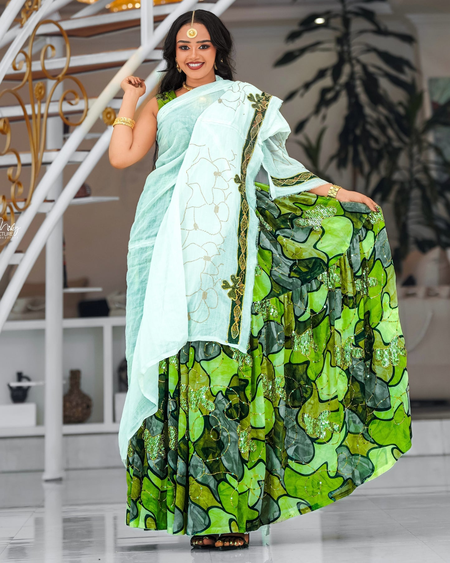 Emerald Habesha chiffion  in soft silk dress featuring embroidery for Genna holiday gatherings