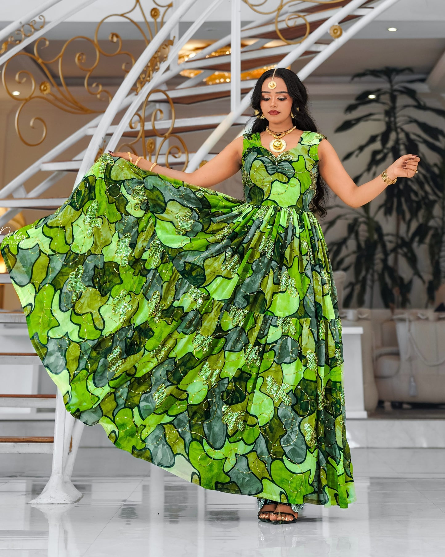 Emerald Habesha chiffion  in soft silk dress featuring embroidery for Genna holiday gatherings