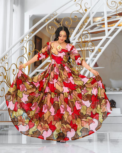 Multicolor Habesha chiffion in soft flowing featuring gold silk embroidery for Genna holiday gatherings
