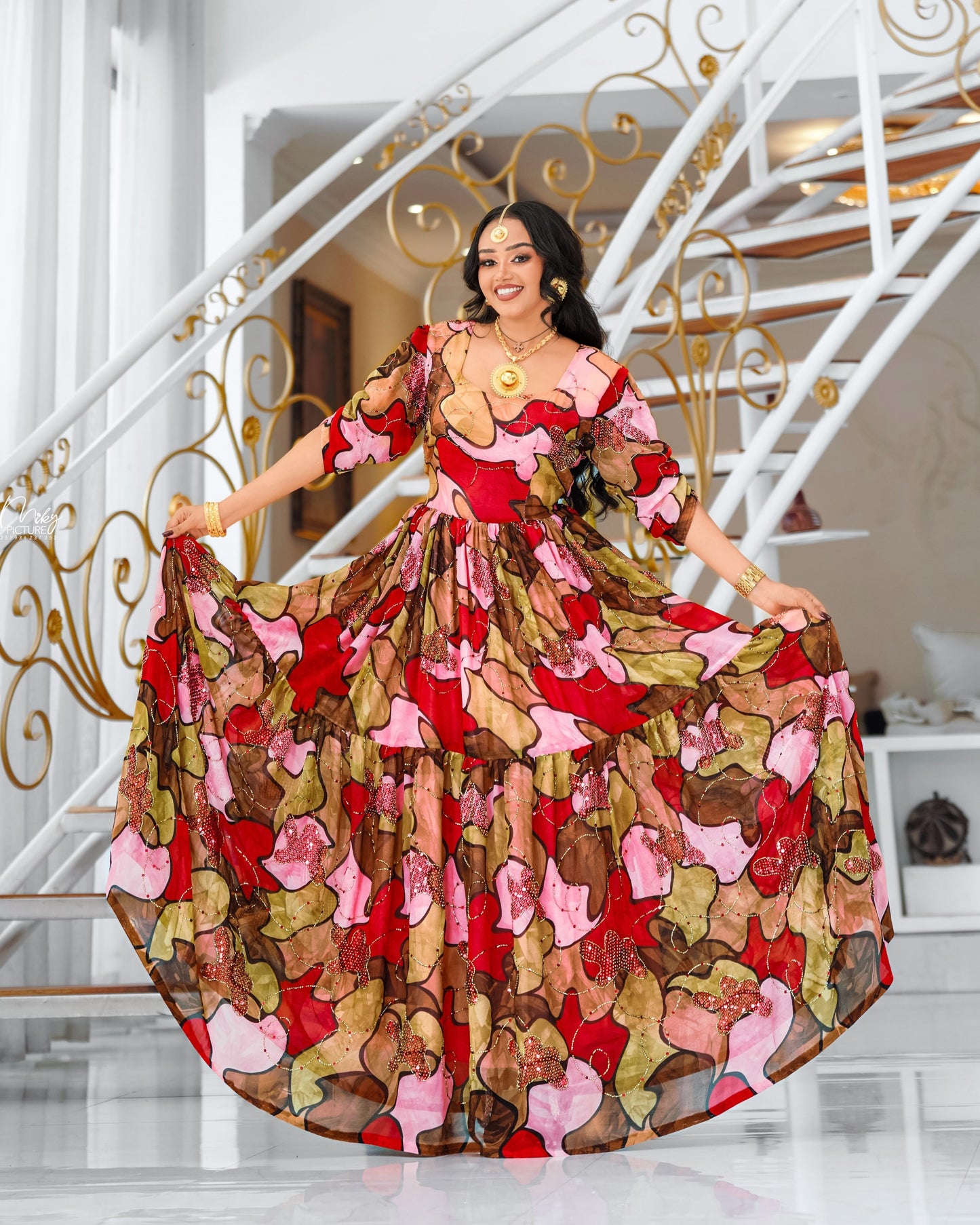 Multicolor Habesha chiffion in soft flowing featuring gold silk embroidery for Genna holiday gatherings