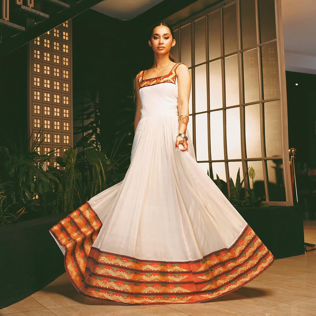 Modern Habesha Kemis – White Handwoven Ethiopian Dress with Vibrant Border