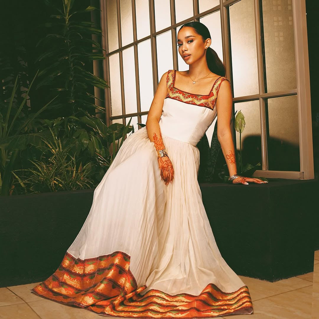 Modern Habesha Kemis – White Handwoven Ethiopian Dress with Vibrant Border