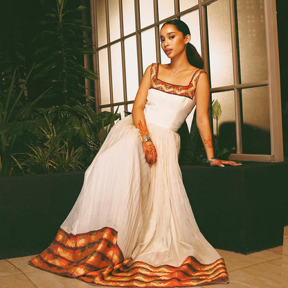 Modern Habesha Kemis – White Handwoven Ethiopian Dress with Vibrant Border