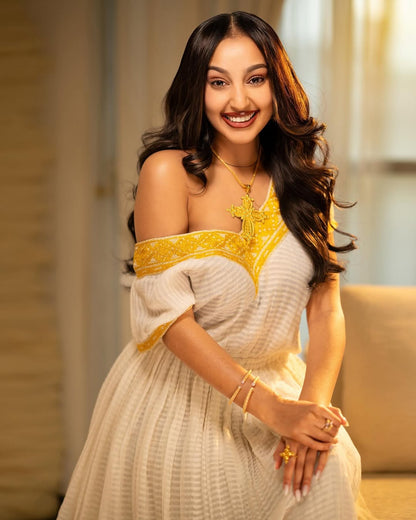 White & Yellow Habesha Kemis – Flowing Traditional Ethiopian wear by Tesfaye Mehari