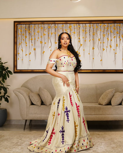 Ivory Mermaid Habesha Kemis – Off-Shoulder Ethiopian Wedding Dress by Tesfaye Mehari