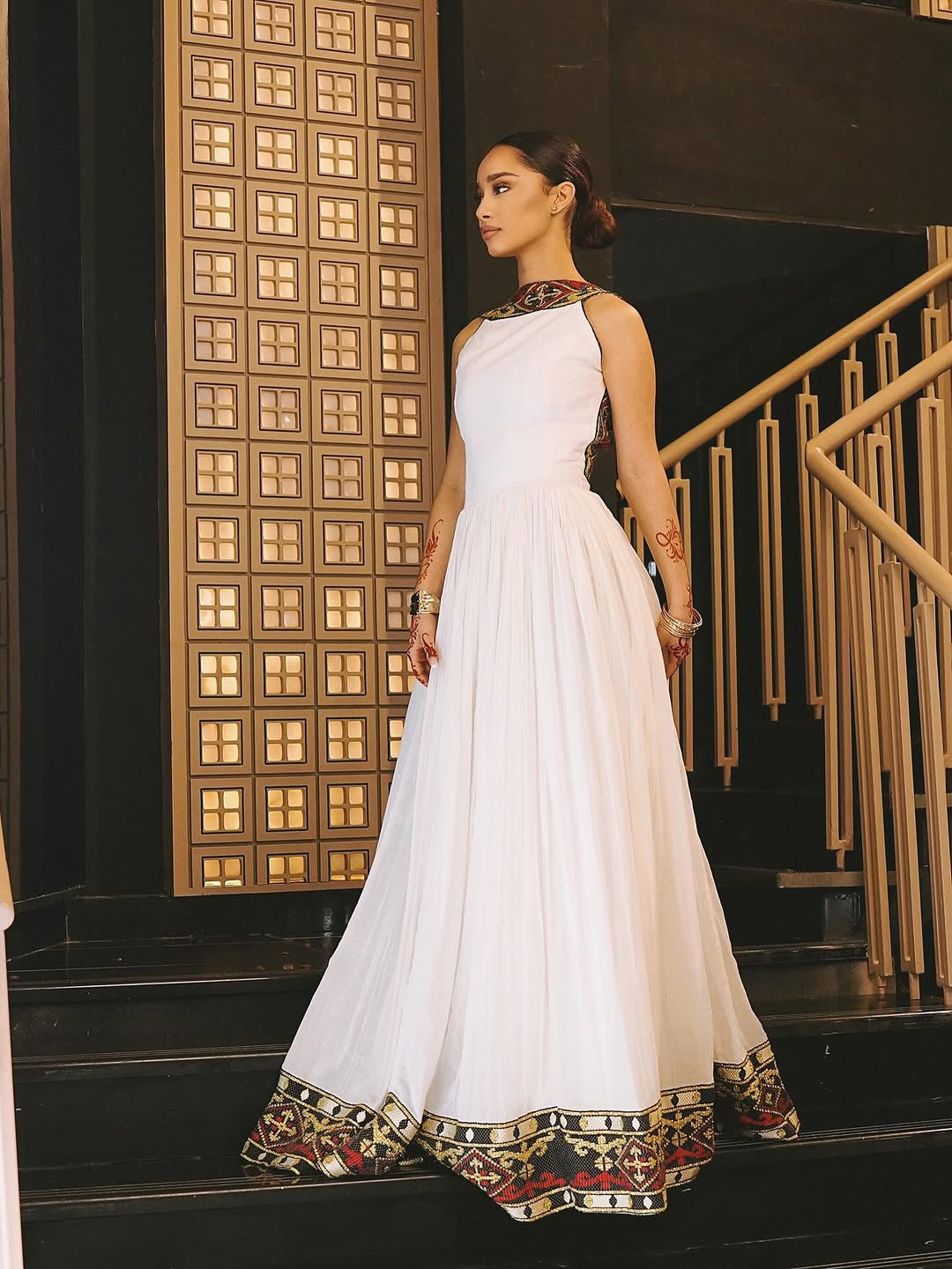 Elegant High-Neck Habesha Dress – Traditional Black & Gold Border kemis by Tsehaye Mehari