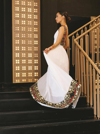 Elegant High-Neck Habesha Dress – Traditional Black & Gold Border kemis by Tsehaye Mehari