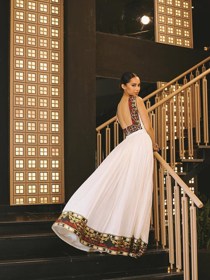 Elegant High-Neck Habesha Dress – Traditional Black & Gold Border kemis by Tsehaye Mehari