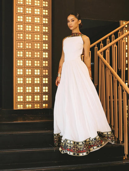 Elegant High-Neck Habesha Dress – Traditional Black & Gold Border kemis by Tsehaye Mehari