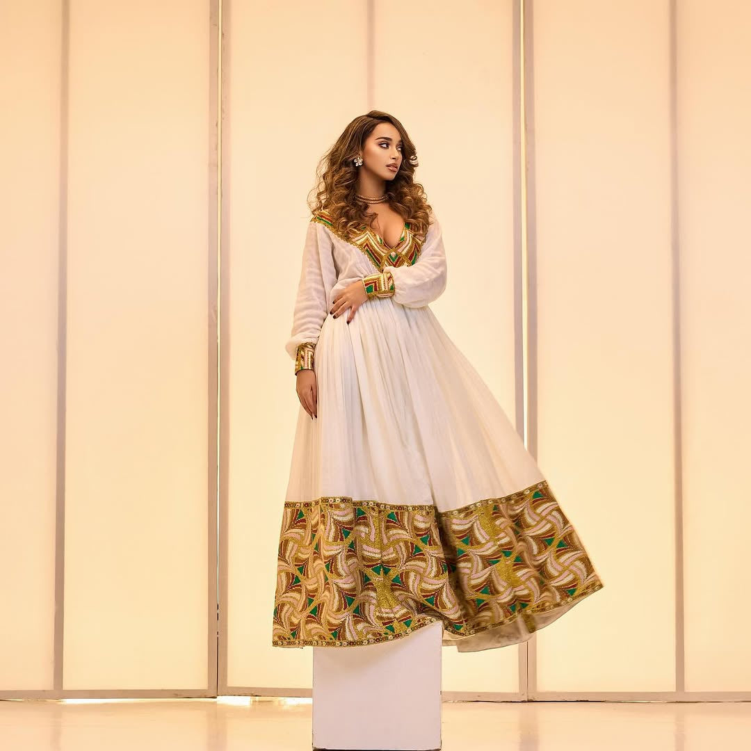 Gold Tones Habesha Kemis – The Celebration Collection for holidays by Tsehaye Mehari