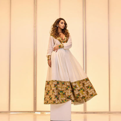 Gold Tones Habesha Kemis – The Celebration Collection for holidays by Tsehaye Mehari