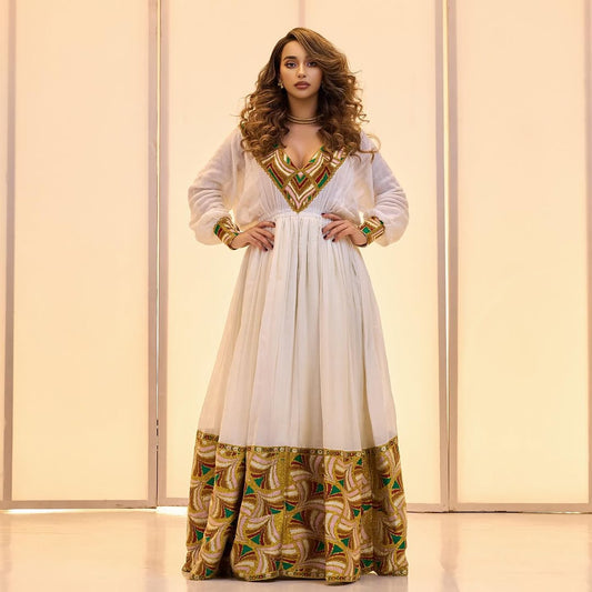 Gold Tones Habesha Kemis – The Celebration Collection for holidays by Tsehaye Mehari