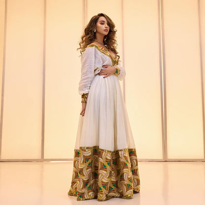 Gold Tones Habesha Kemis – The Celebration Collection for holidays by Tsehaye Mehari