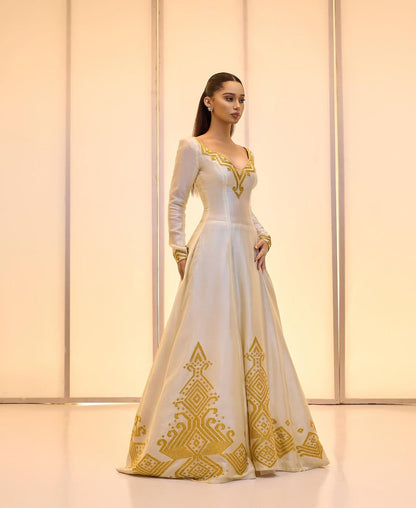 Elegant Golden bridal Kemis – Modern Full-Sleeve Ethiopian wedding dress by Tesfaye Mehari