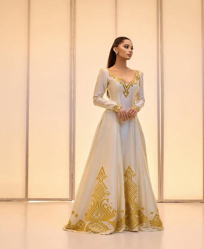 Elegant Golden bridal Kemis – Modern Full-Sleeve Ethiopian wedding dress by Tesfaye Mehari