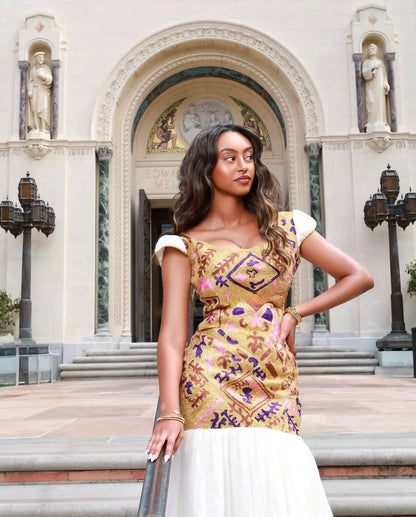 Golden Elegance: Stunning Mermaid Half-Shoulder Habesha Kemis with Exquisite Detailing by Tsehaye Mehari