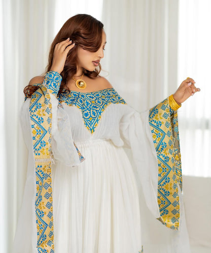 Elegance Blue & Gold Habesha Kemis - Modern Handwoven Ethiopian Dress by Tsehaye Mehari