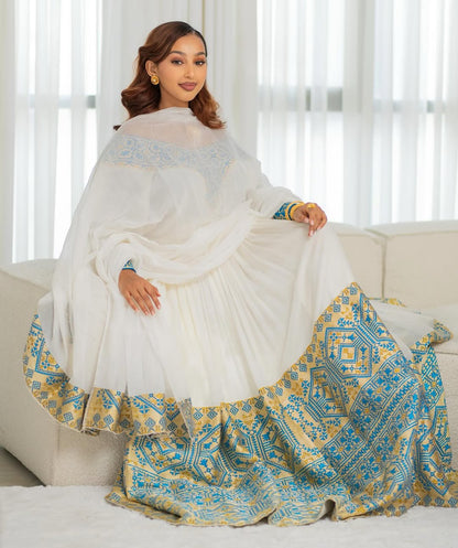 Elegance Blue & Gold Habesha Kemis - Modern Handwoven Ethiopian Dress by Tsehaye Mehari