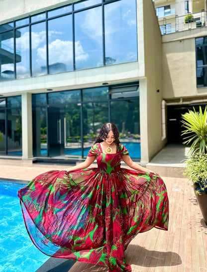Woman in a colorful Habesha Chiffon  standing by a pool with a modern building in the background