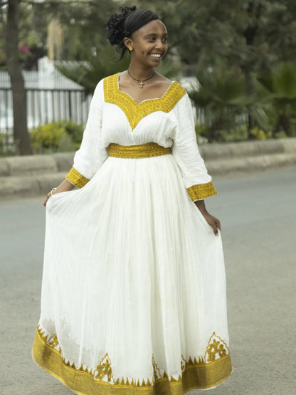 Simple Traditional Ethiopian Dress with Yellow Embroidery – White Cotton Habesha Dress